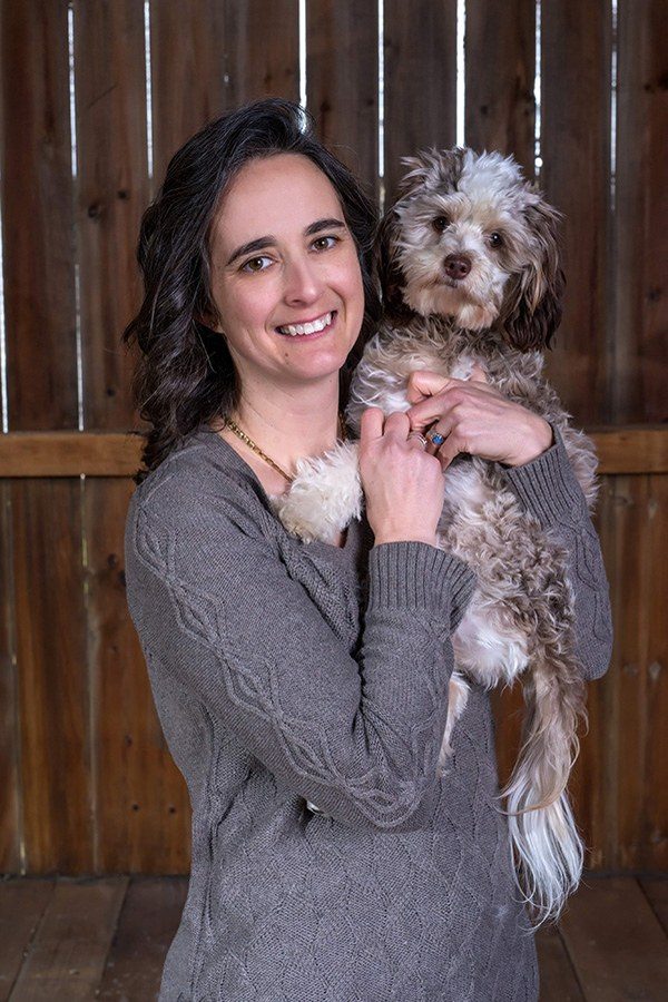 Jenn Carson, holding her dog